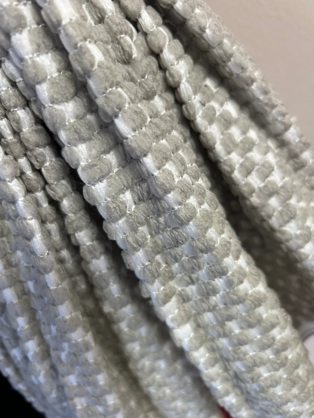 Detalle de paño de microfibra premium de alta calidad y durabilidad