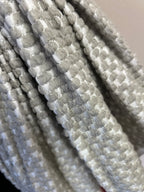 Detalle de paño de microfibra premium de alta calidad y durabilidad